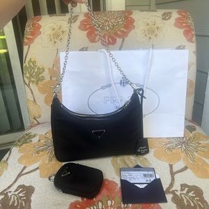 Prada Re-Edition 2005 Re-Nylon hand bag. Crossbody not included.